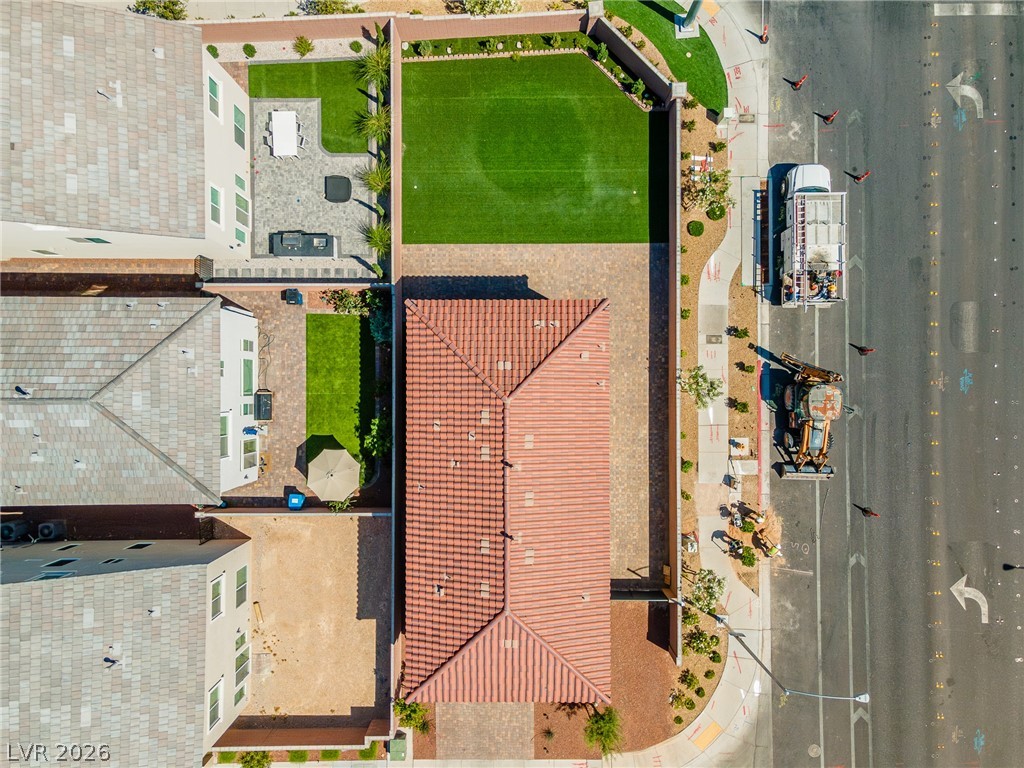 5510 Ripple Ridge Avenue Las Vegas, NV 89139 - Photo 6 of 45 An aerial view showcases a residential property with lush landscaping and outdoor amenities.