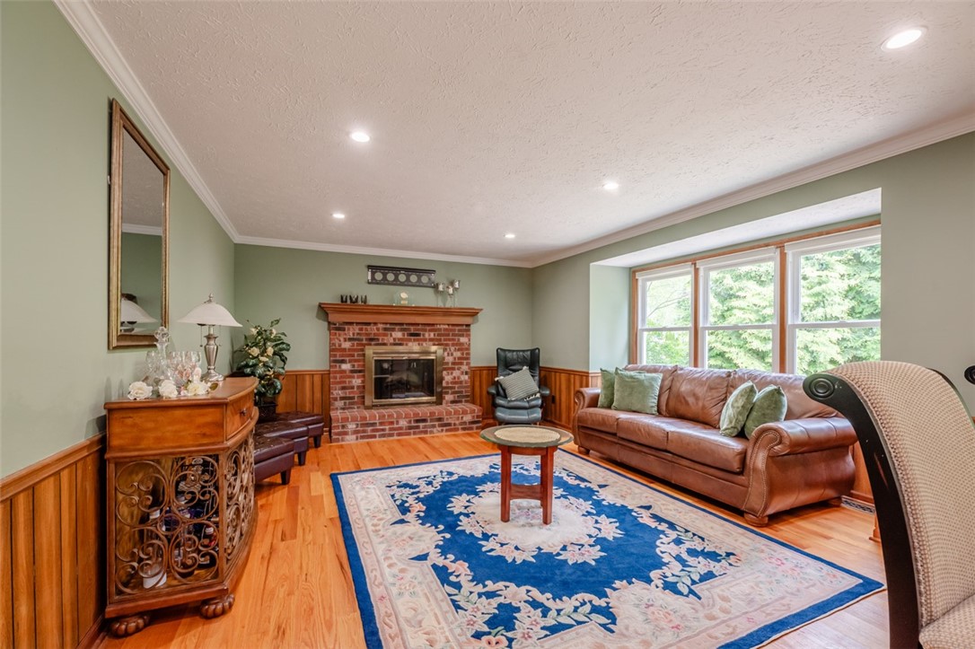 77 Misty Pine Road Perinton, NY 14450 - Photo 14 of 47 THE FAMILY ROOM FEATURES A WOODBURNING FIREPLACE.