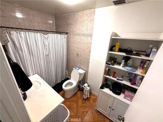 a bathroom with a sink and a toilet