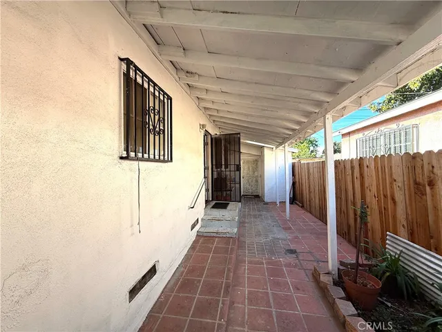 a view of a garage with cars