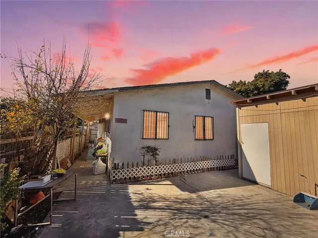 a house view with a backyard space