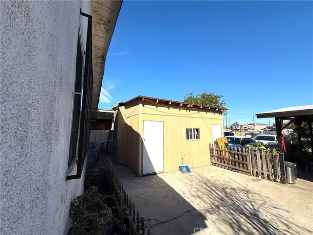 a view of a house with a patio