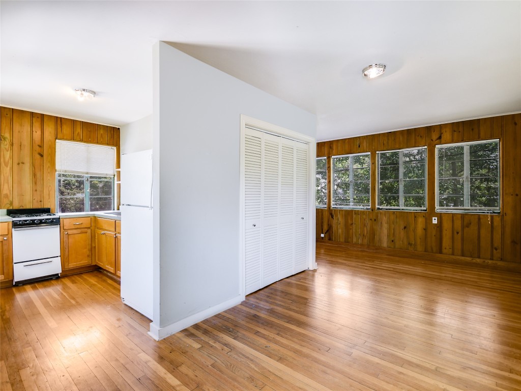 2304 Longview Street Austin, TX 78705 - Photo 24 of 31 a view of a room with wooden floor and windows