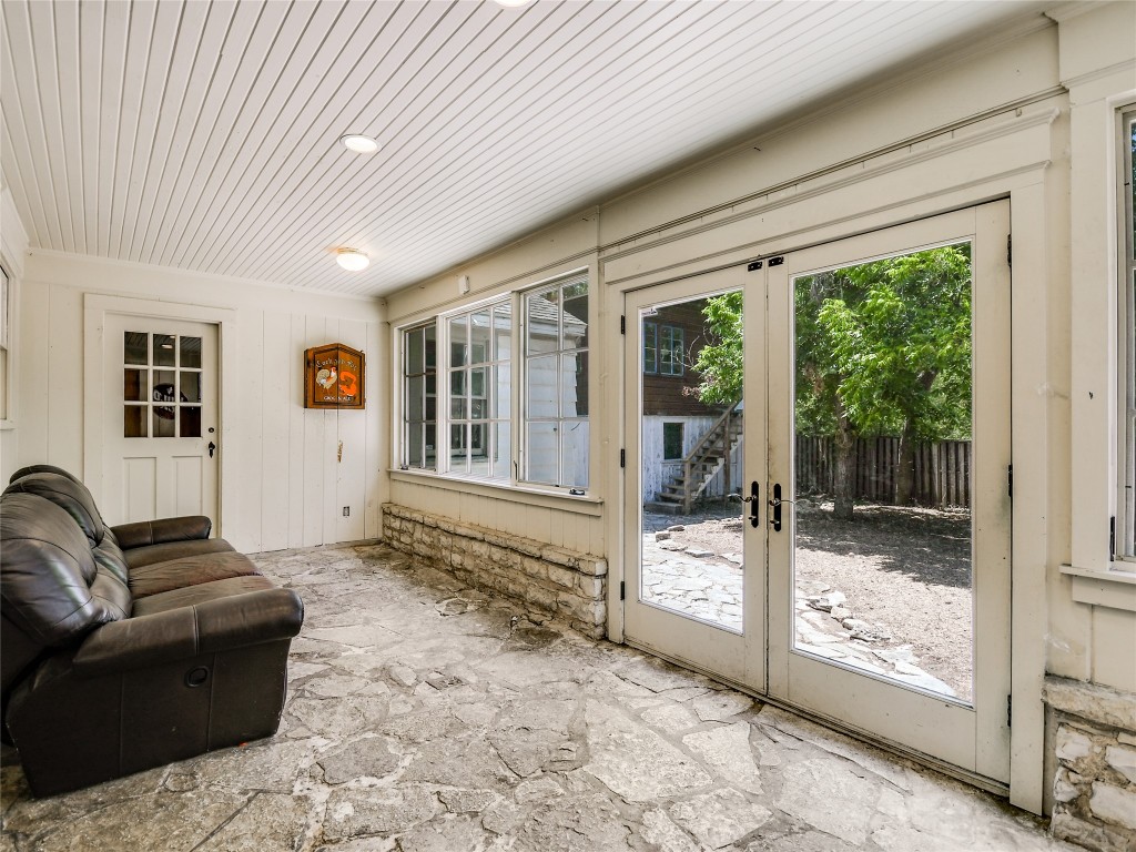 2304 Longview Street Austin, TX 78705 - Photo 10 of 31 a living room with furniture tv and a large window