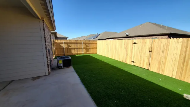 a view of a back yard of the house