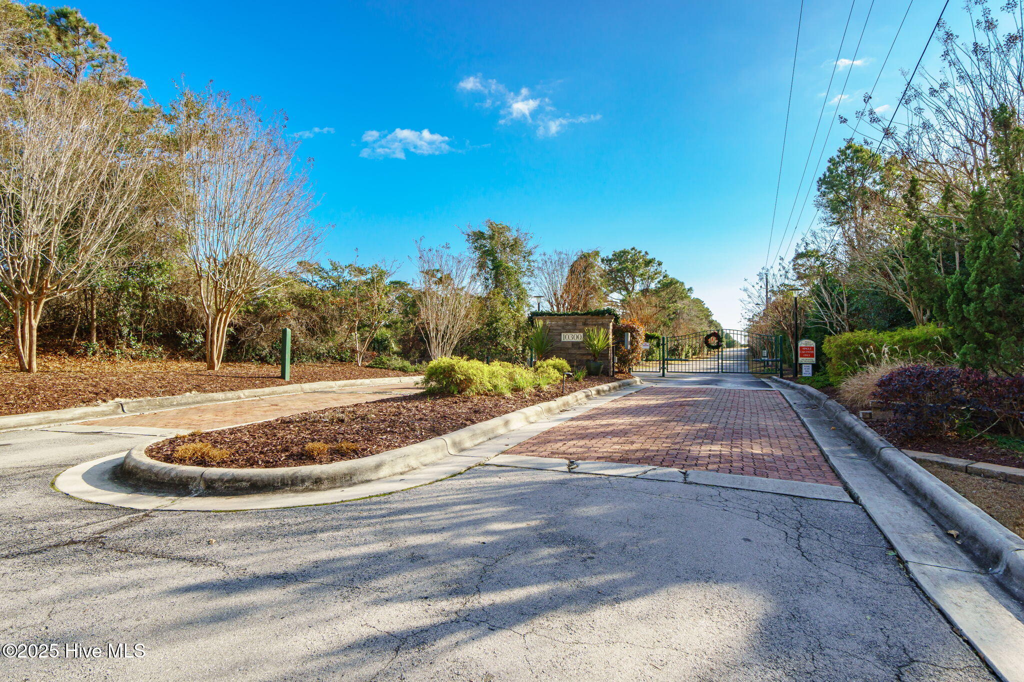 10300 Coast Guard Road, Unit C103 POINT EMERALD VILLAS Emerald Isle, NC 28594 - Photo 34 of 44 Gated entrance