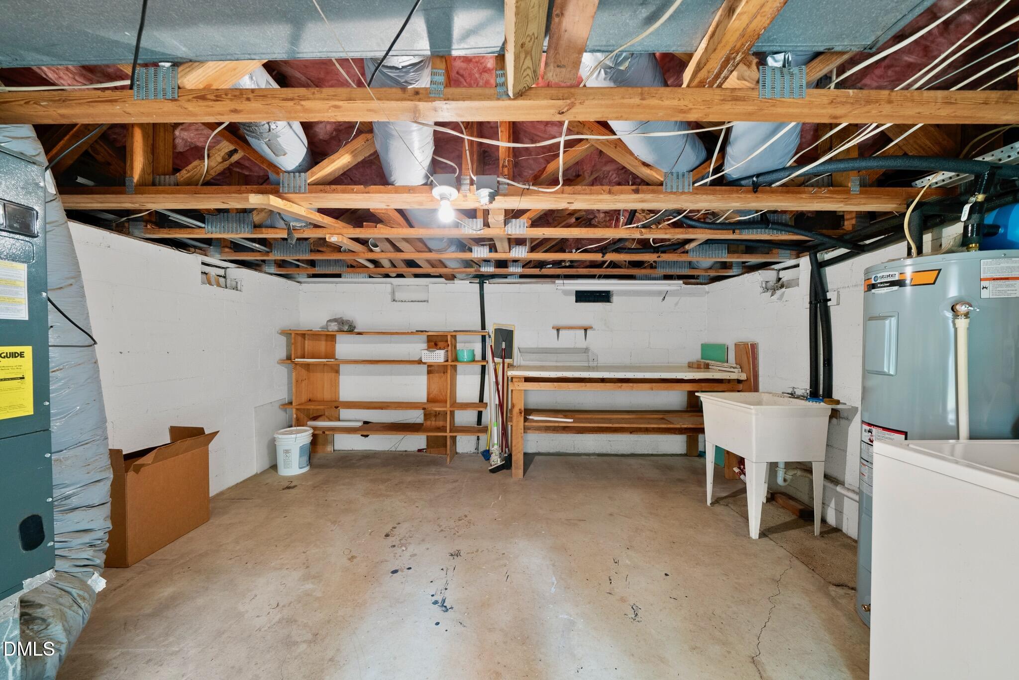3634 Mill Run Raleigh, NC 27612 - Photo 18 of 18 a view of a patio with table and chairs