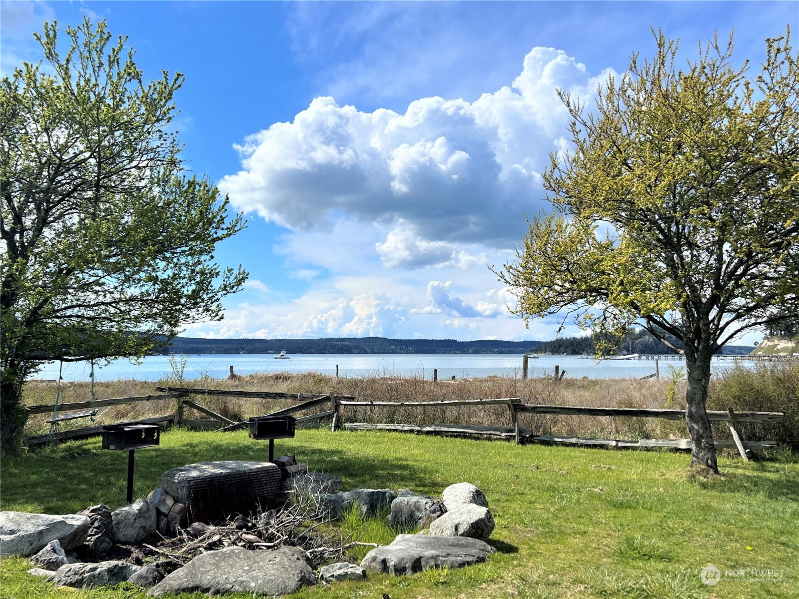 236 South Ridge Road Anacortes, WA 98221 - Photo 21 of 25 a view of a garden with an outdoor seating