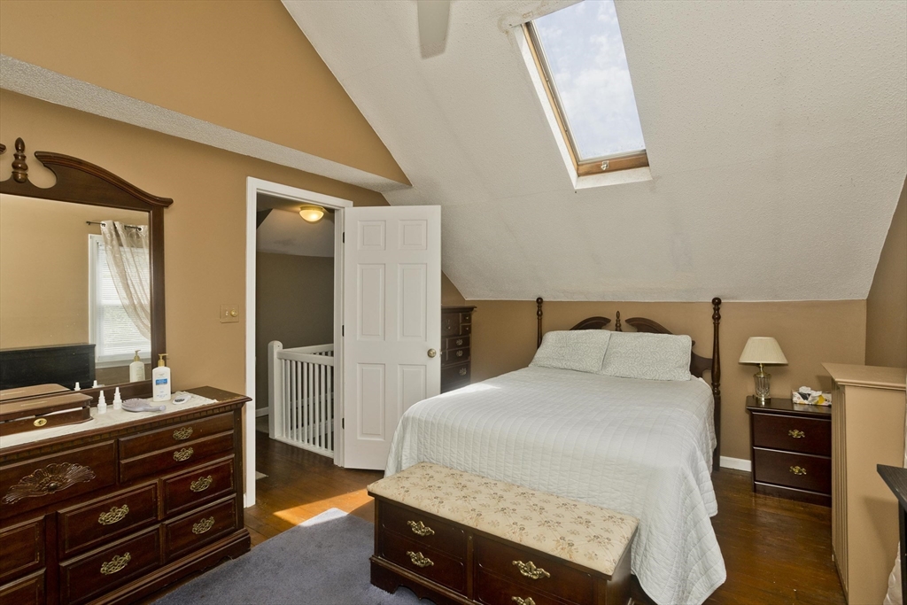 103 Hillcrest Avenue West Springfield, MA 01089 - Photo 14 of 28 a bedroom with a bed and a dresser