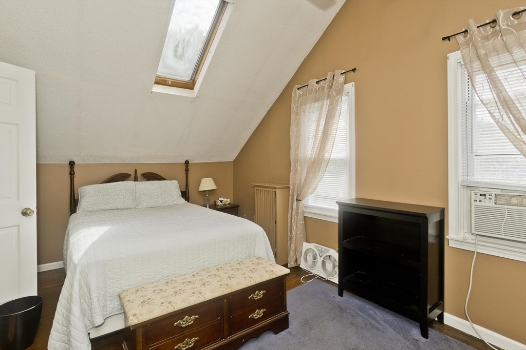 103 Hillcrest Avenue West Springfield, MA 01089 - Photo 15 of 28 a bedroom with a bed and a window