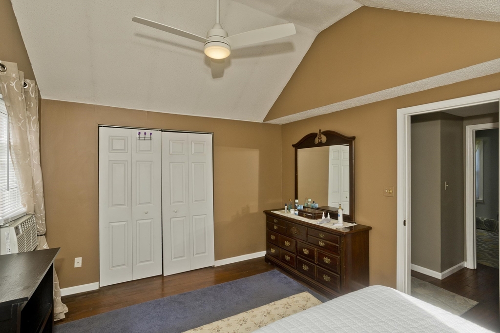 103 Hillcrest Avenue West Springfield, MA 01089 - Photo 16 of 28 a bedroom with a bed and wooden floor