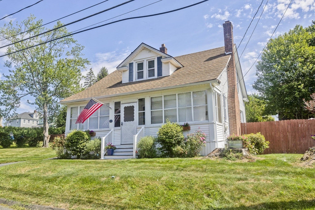 103 Hillcrest Avenue West Springfield, MA 01089 - Photo 2 of 28 a front view of a house with a yard
