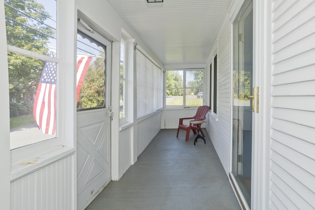 103 Hillcrest Avenue West Springfield, MA 01089 - Photo 27 of 28 a view of a hallway with couches and dining room view