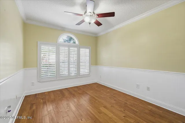 a view of a kitchen with granite countertop a sink and a granite counter tops
