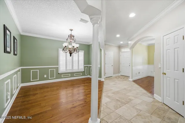 a bathroom with a granite countertop toilet a sink and a shower
