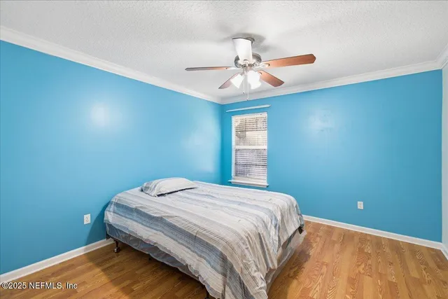 an aerial view of a house with a lake view