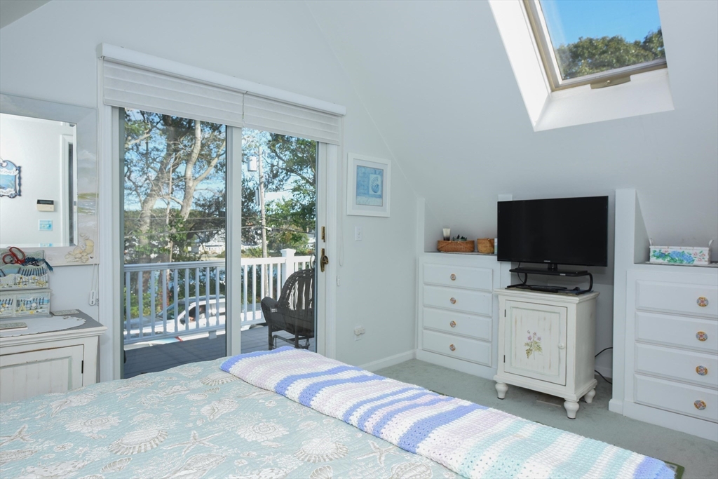 8 East Boulevard Wareham, MA 02558 - Photo 13 of 39 a bedroom with a bed and large window