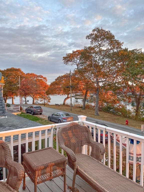 8 East Boulevard Wareham, MA 02558 - Photo 19 of 39 a view of a balcony with two chairs and a table