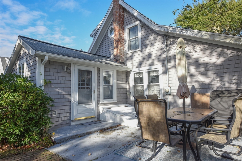 8 East Boulevard Wareham, MA 02558 - Photo 25 of 39 a view of a chair and table in the balcony