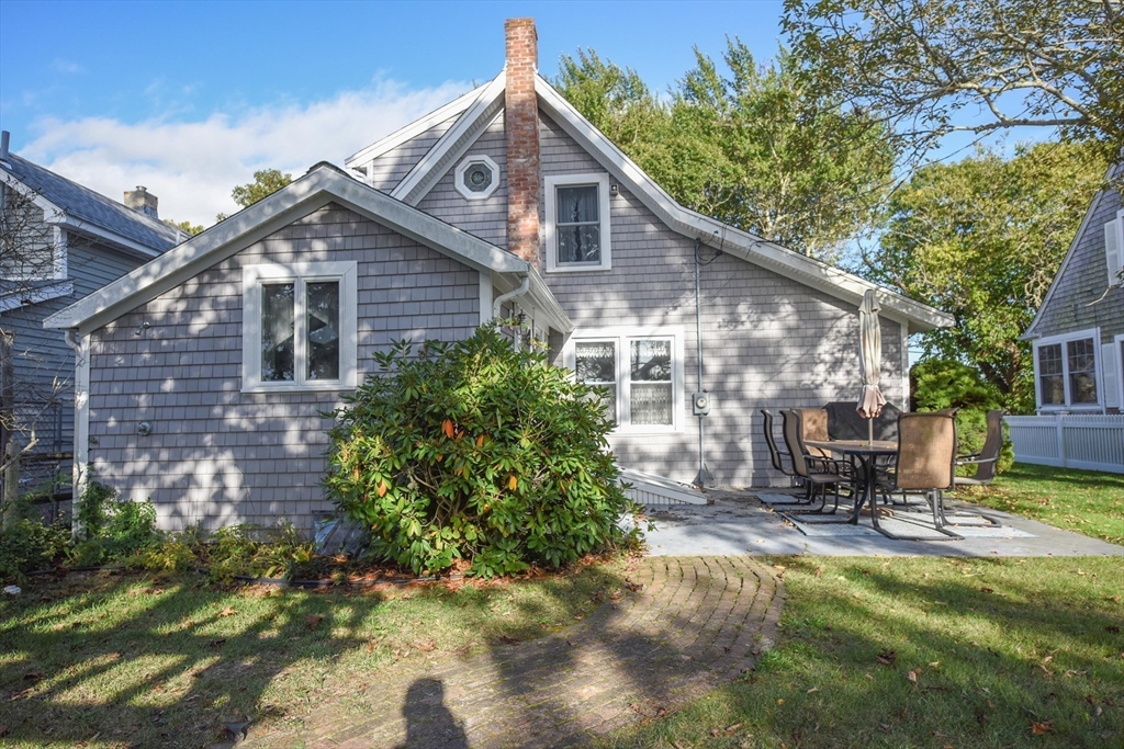 8 East Boulevard Wareham, MA 02558 - Photo 26 of 39 a front view of a house with yard and green space