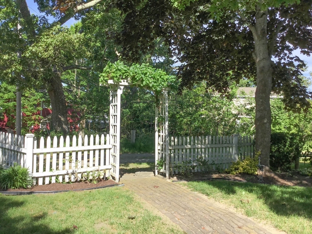 8 East Boulevard Wareham, MA 02558 - Photo 29 of 39 a view of a bench in the garden