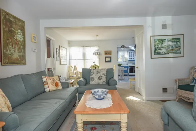 a living room with furniture and a couch