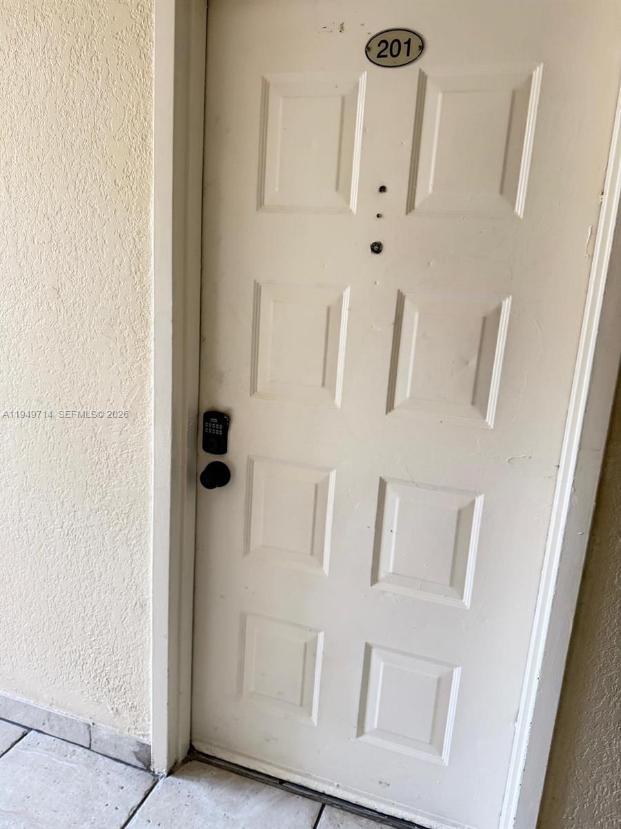 7010 Northwest 186th Street, Unit 5201 Hialeah, FL 33015 - Photo 11 of 29 a view of door