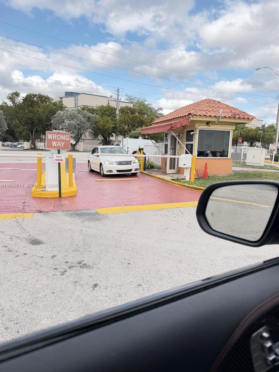 7010 Northwest 186th Street, Unit 5201 Hialeah, FL 33015 - Photo 2 of 29 an outdoor view with patio