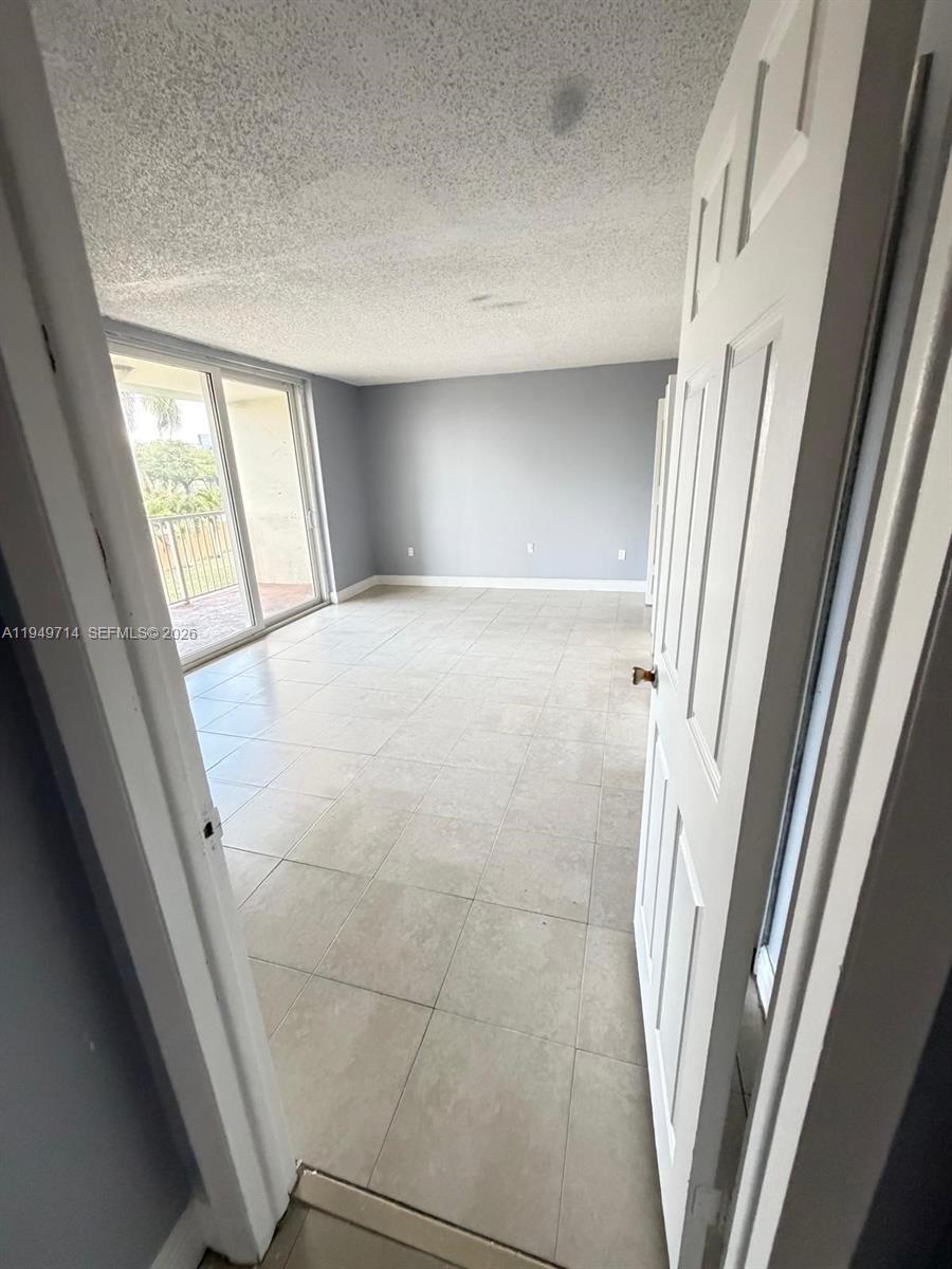 7010 Northwest 186th Street, Unit 5201 Hialeah, FL 33015 - Photo 21 of 29 a view of a livingroom with a sink and a window