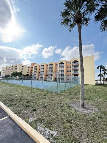 a view of a swimming pool with a lake view