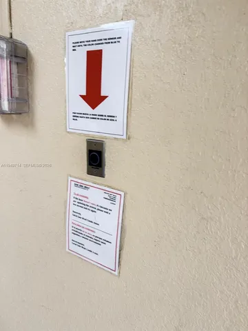 a bathroom with a shower and a mirror