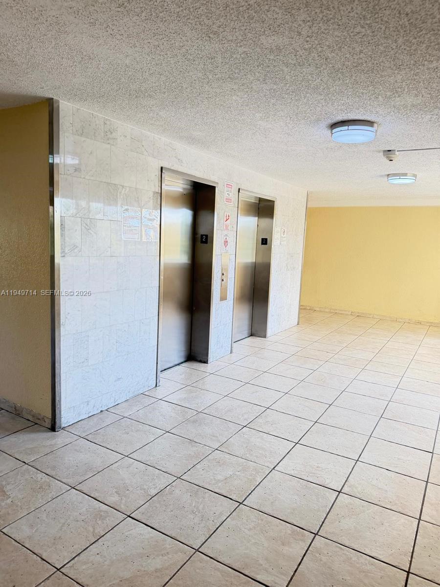 7010 Northwest 186th Street, Unit 5201 Hialeah, FL 33015 - Photo 9 of 29 a view of a room & utility room