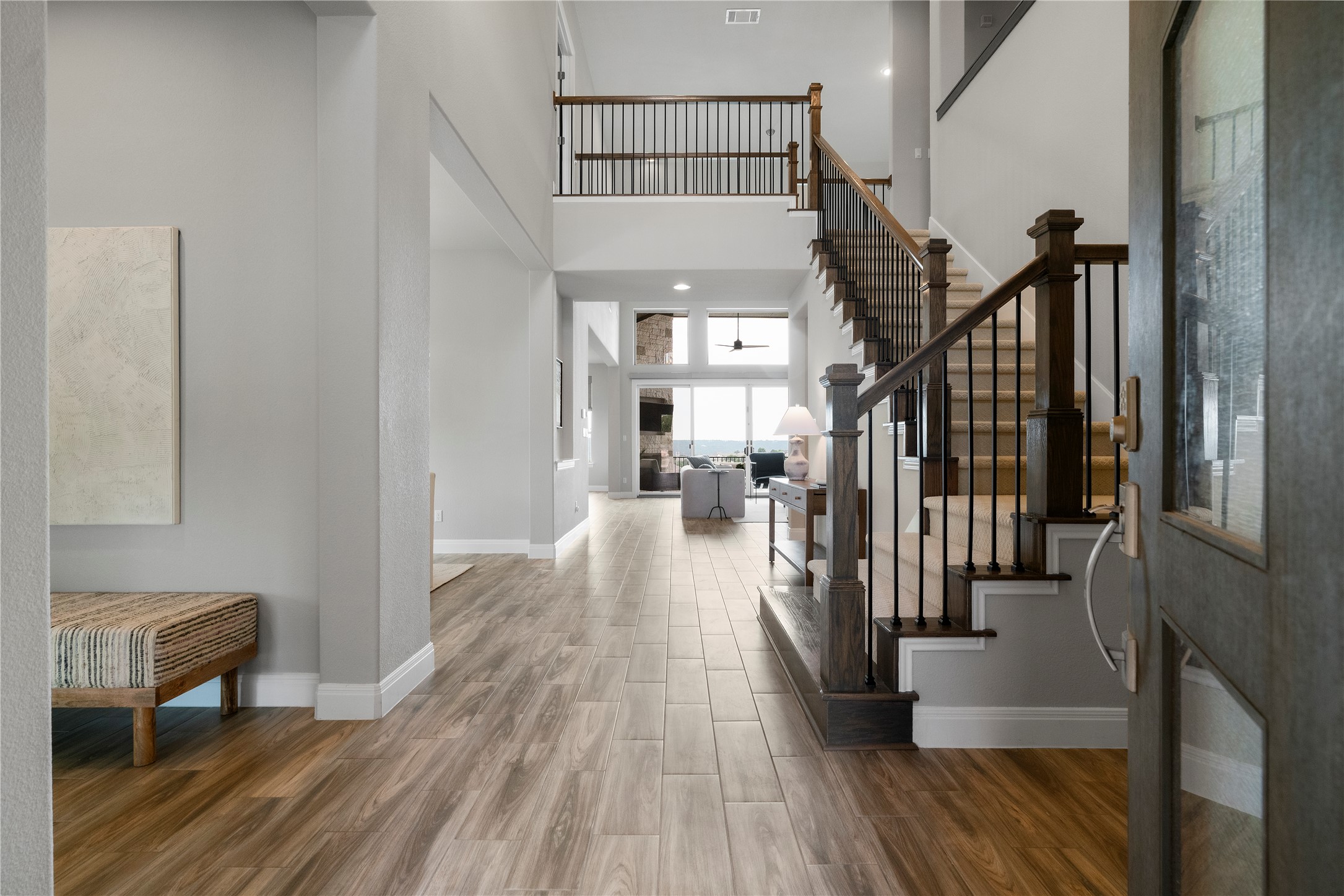 2033 Portobello Road Leander, TX 78641 - Photo 11 of 40 a view of entryway and hall with wooden floor