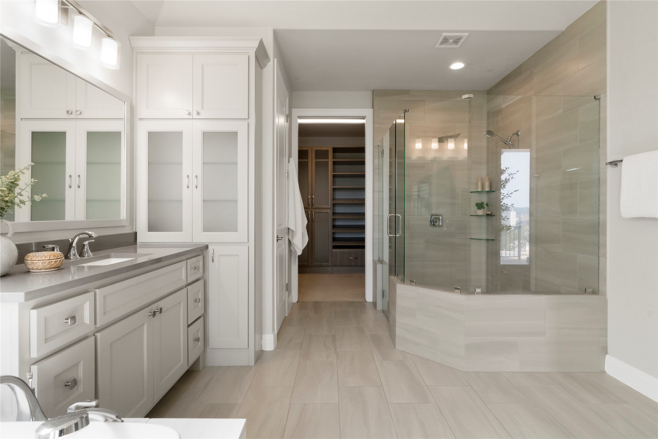 2033 Portobello Road Leander, TX 78641 - Photo 21 of 39 An oversized walk-in shower is equipped with dual showerheads.