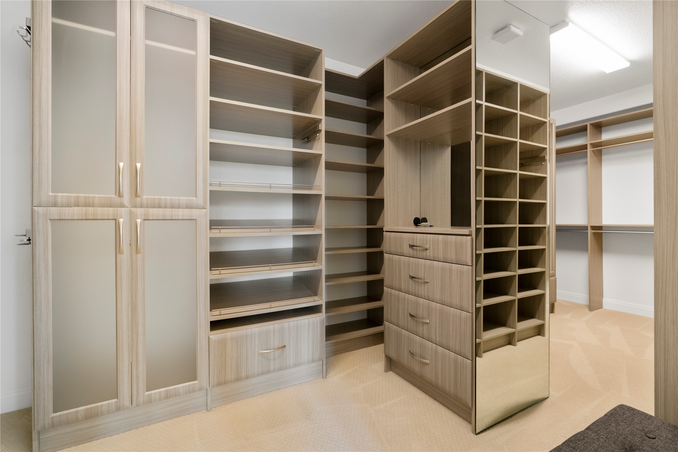 2033 Portobello Road Leander, TX 78641 - Photo 23 of 40 Your dream closet awaits with a custom, built-in storage system.