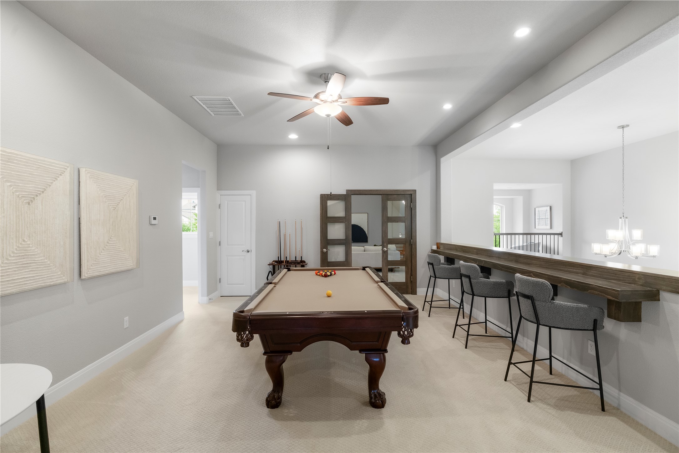 2033 Portobello Road Leander, TX 78641 - Photo 25 of 39 Ascending upstairs, you'll be guided to a lofted game room.