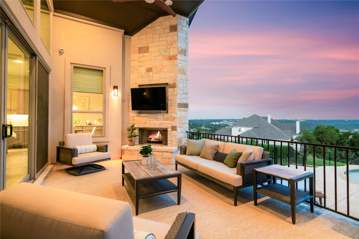 2033 Portobello Road Leander, TX 78641 - Photo 35 of 40 The lounge area features a cozy fireplace.