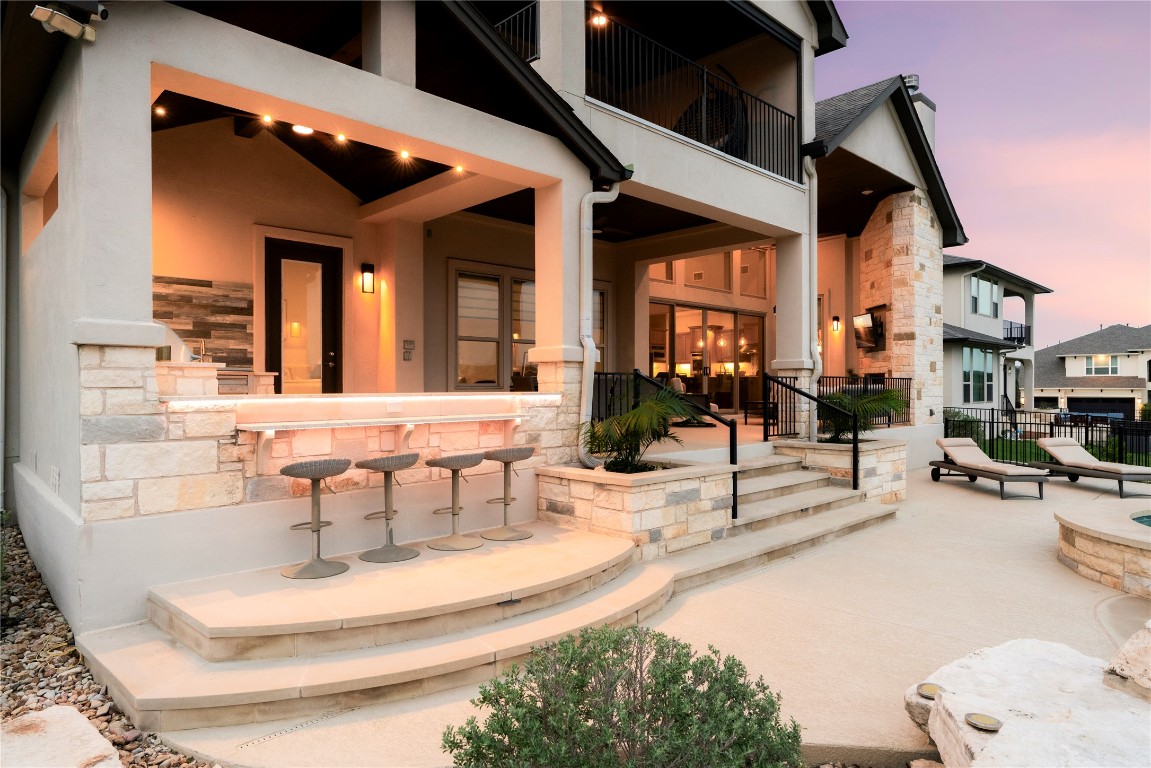 2033 Portobello Road Leander, TX 78641 - Photo 36 of 40 The outdoor oasis incorporates lounge, al fresco dining, and grilling spaces.