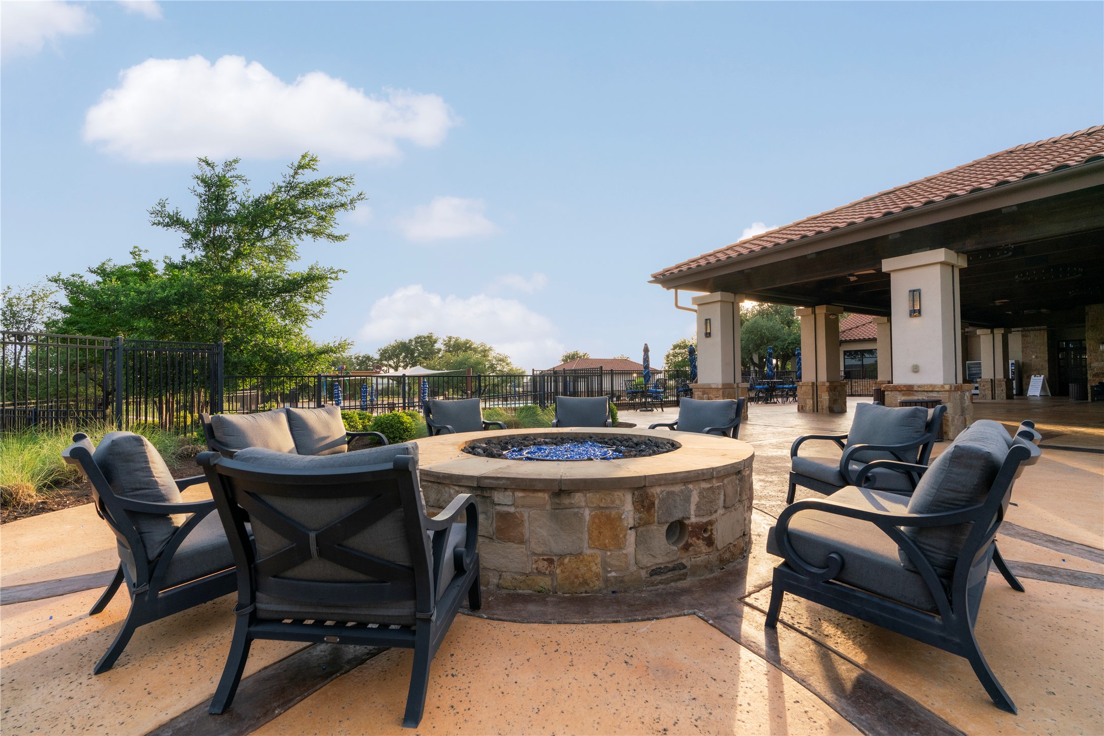 2033 Portobello Road Leander, TX 78641 - Photo 7 of 40 a view of a patio with couches table and chairs and potted plants