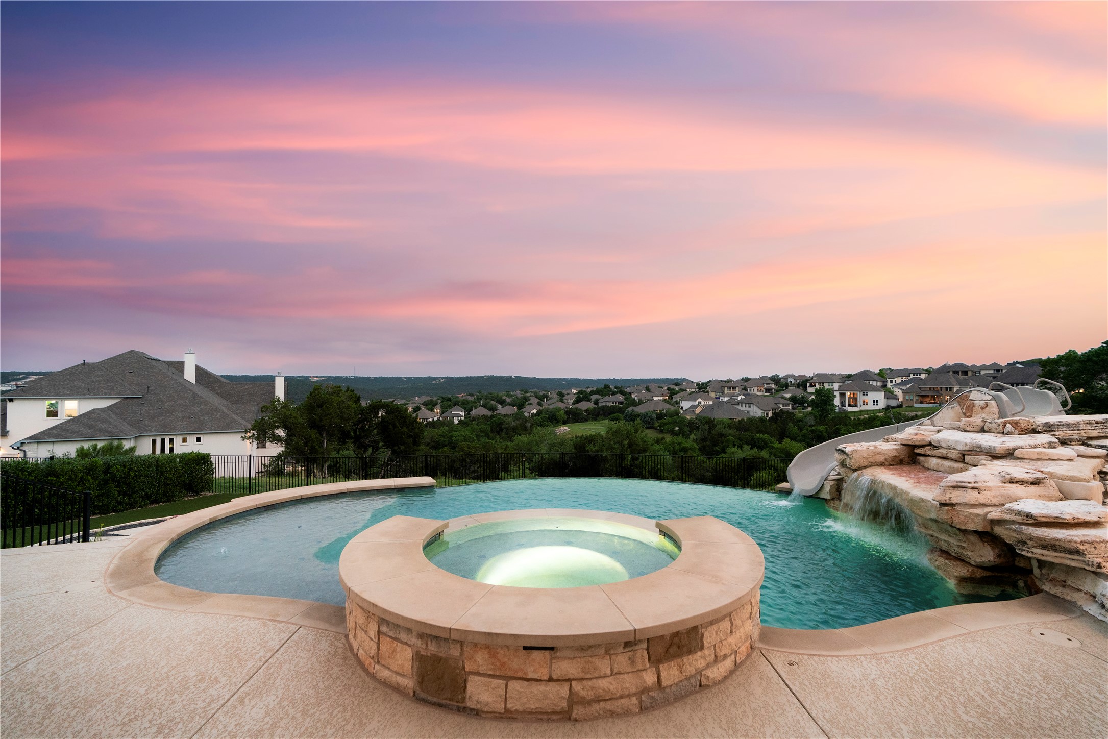 2033 Portobello Road Leander, TX 78641 - Photo 7 of 39 Perched atop a hill, enjoy breathtaking views for miles beyond your backyard oasis.