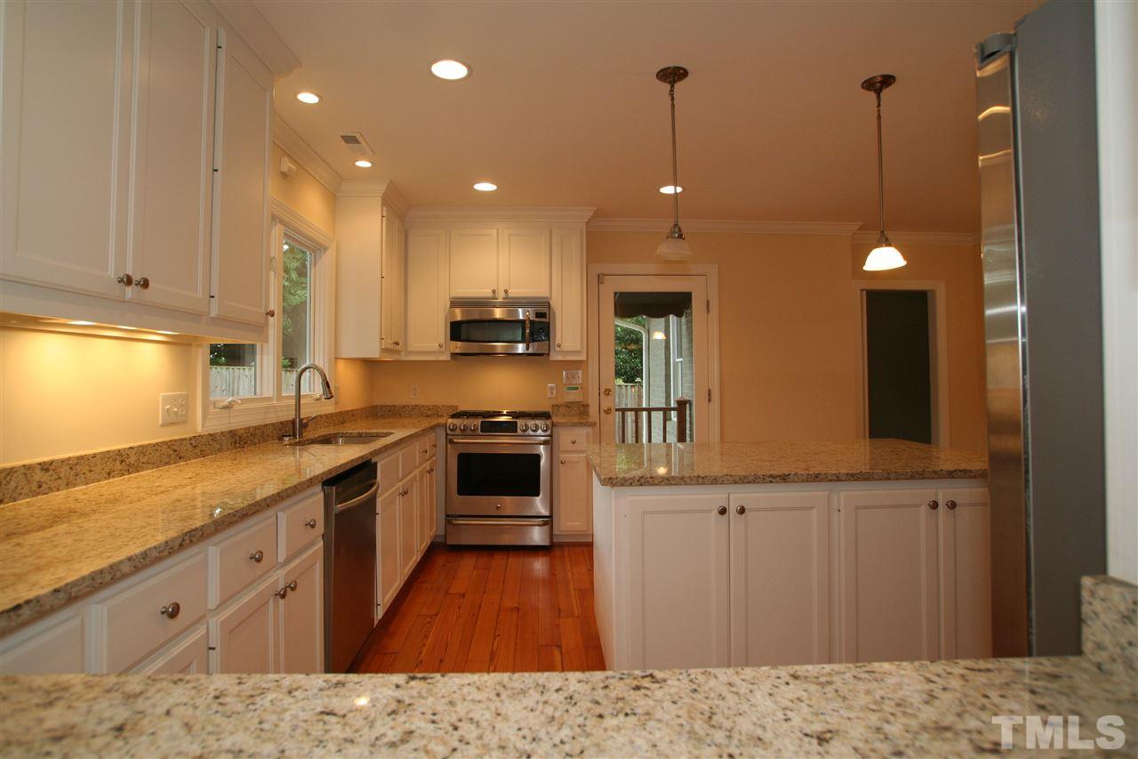 3021 Rothgeb Drive Raleigh, NC 27609 - Photo 2 of 22 Kitchen with all stainless steel appliances, new granite countertops...