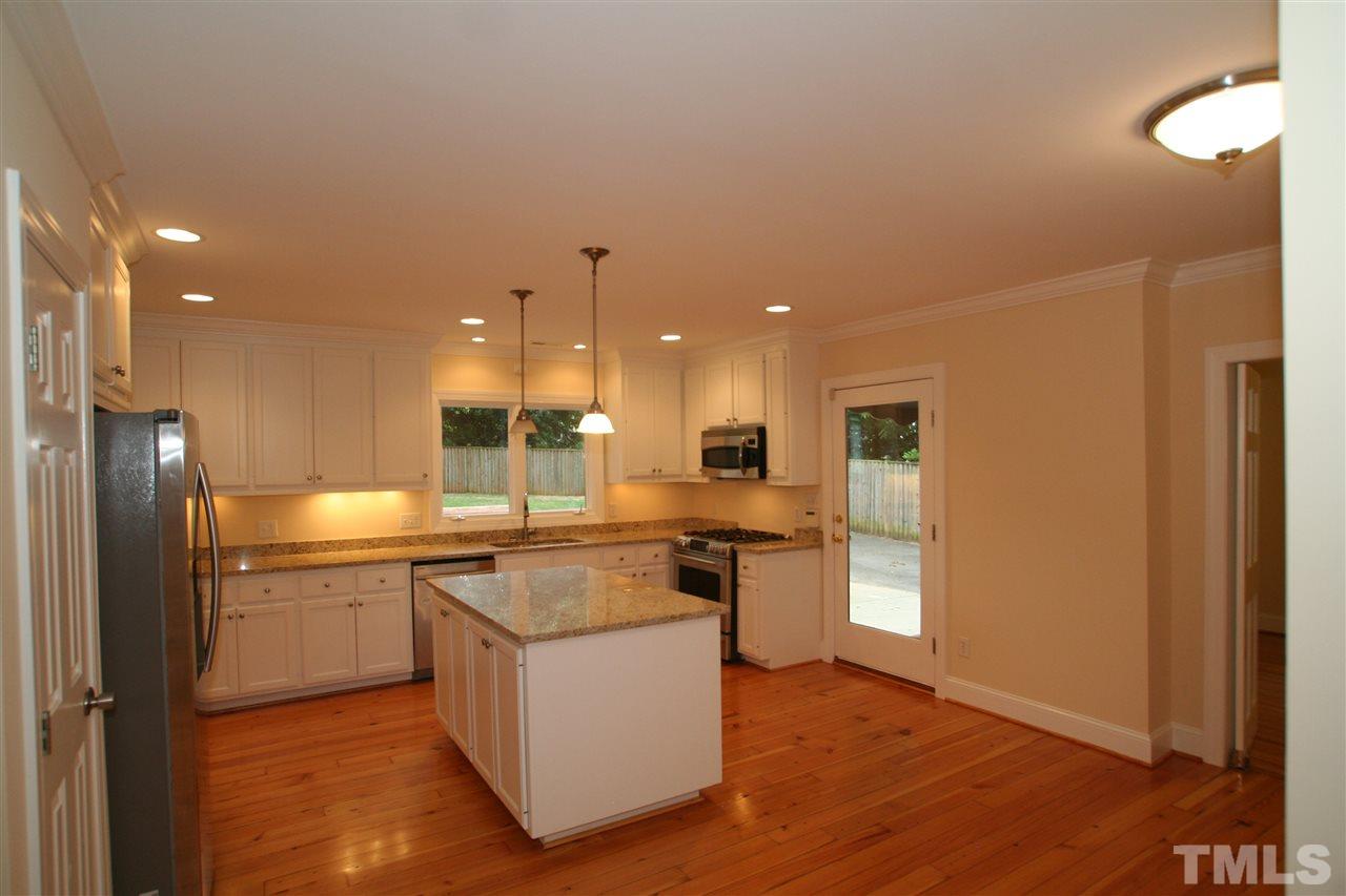 3021 Rothgeb Drive Raleigh, NC 27609 - Photo 3 of 22 Kitchen with all stainless steel appliances, new granite countertops...