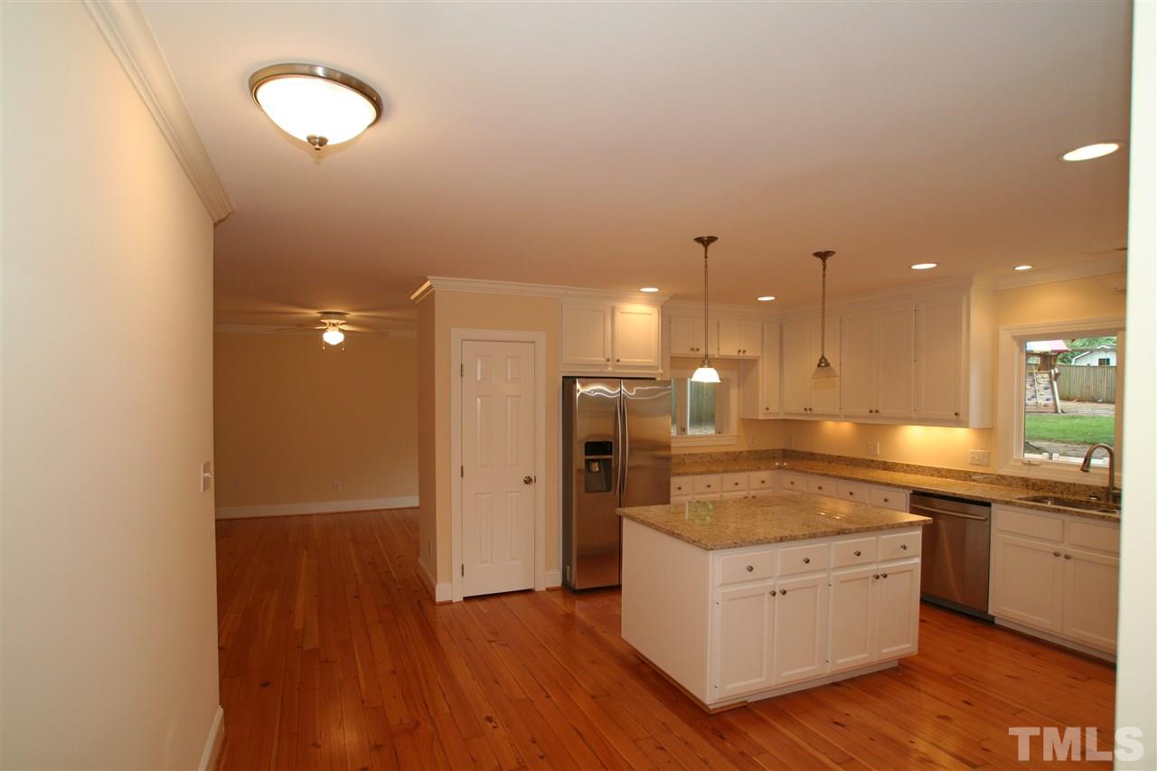 3021 Rothgeb Drive Raleigh, NC 27609 - Photo 6 of 22 Kitchen with all stainless steel appliances, new granite countertops...