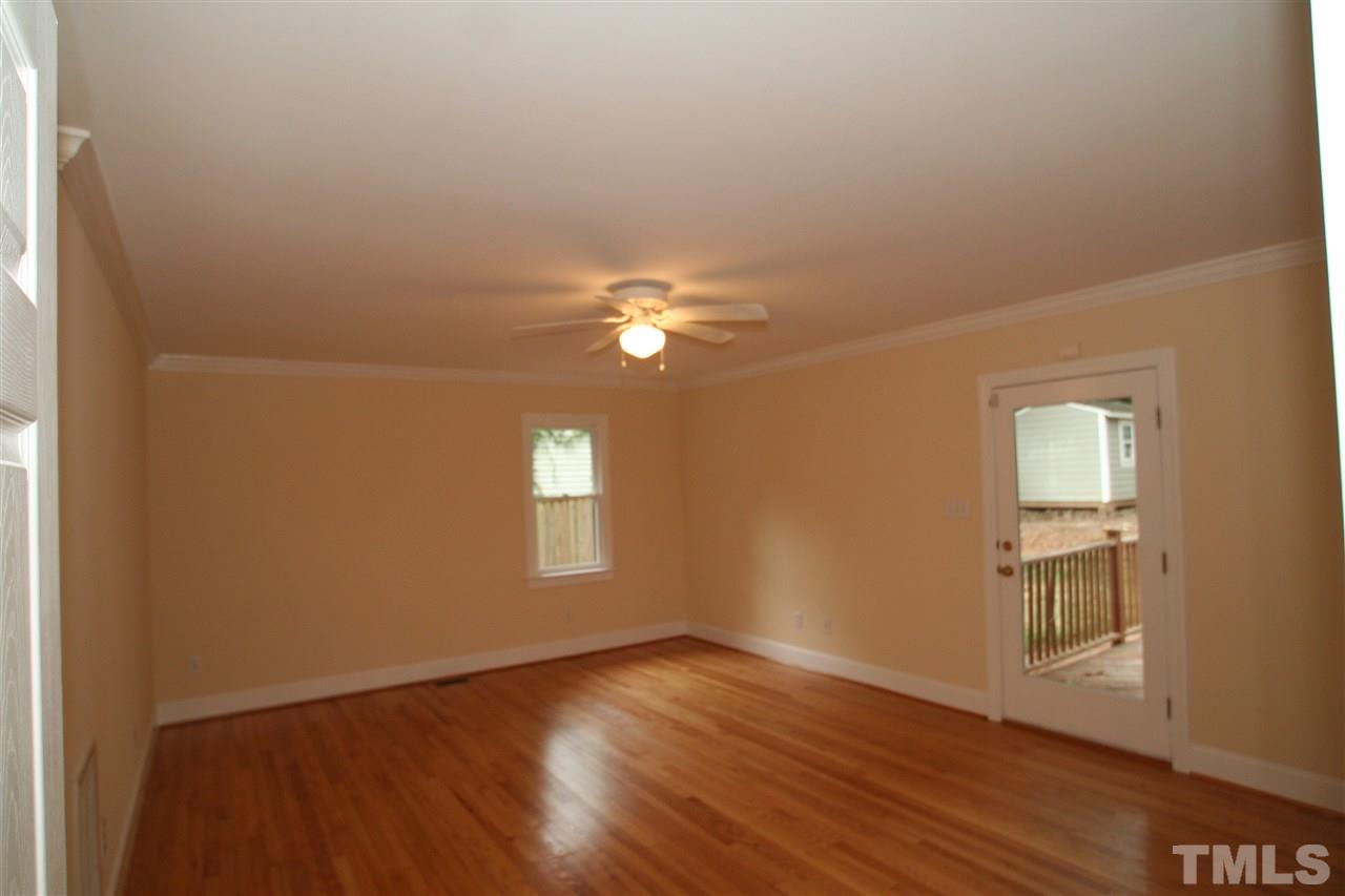 3021 Rothgeb Drive Raleigh, NC 27609 - Photo 8 of 22 1st Floor Master Bedroom- with refinished hardwood floors and new paint, 2 walk-in closets, master bathroom with tub and separate shower...