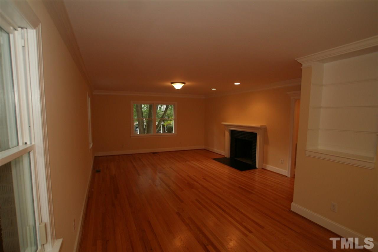 3021 Rothgeb Drive Raleigh, NC 27609 - Photo 9 of 22 with refinished hardwood floors and new paint...