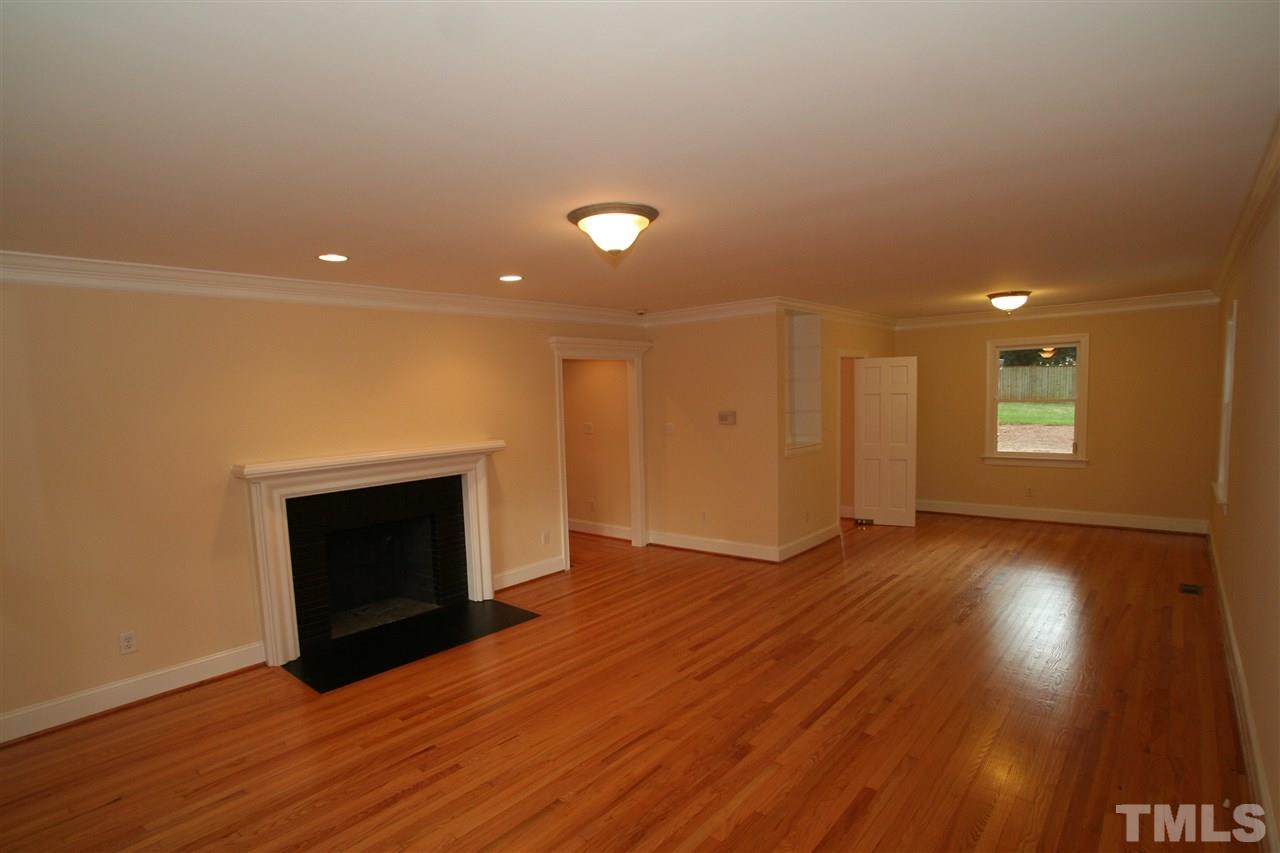 3021 Rothgeb Drive Raleigh, NC 27609 - Photo 10 of 22 with refinished hardwood floors and new paint...