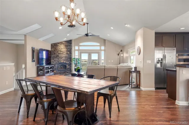 a media room with lots of chairs and a projector screen