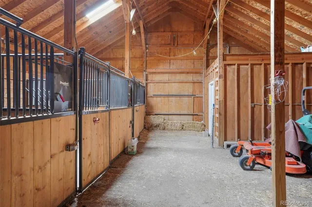 a view of a house with a yard and a garden
