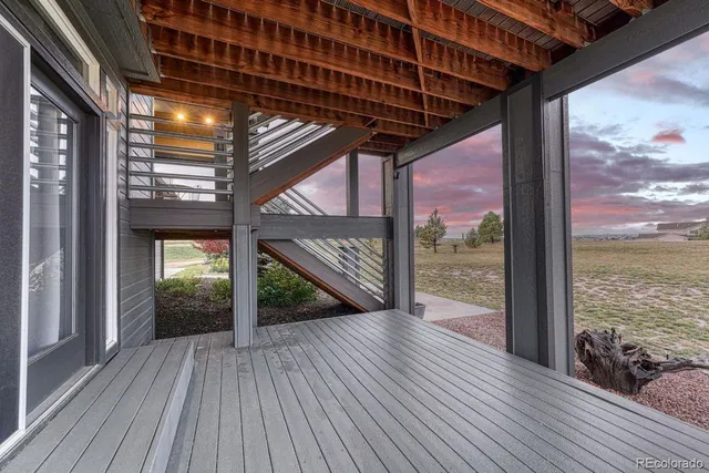 a view of gallery with wooden floor