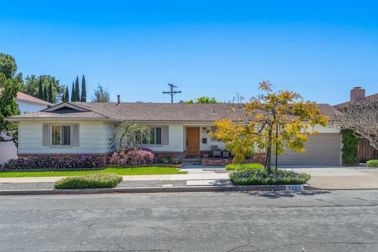 6365 Lambda Drive San Diego, CA 92120 - Photo 1 of 31 a front view of a house with a yard and potted plants